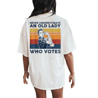 Never Underestimate An Old Lady Who Votes Feminist Women's Oversized Comfort T-Shirt Back Print - Monsterry