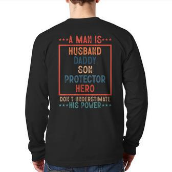 A Man Is Husband Daddy Son Protector Hero Fathers Day Back Print Long Sleeve T-shirt | Mazezy