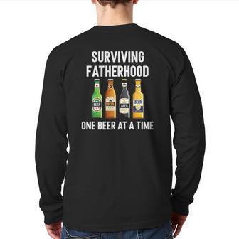 Mens Surviving Fatherhood One Beer At A Time Back Print Long Sleeve T-shirt | Mazezy