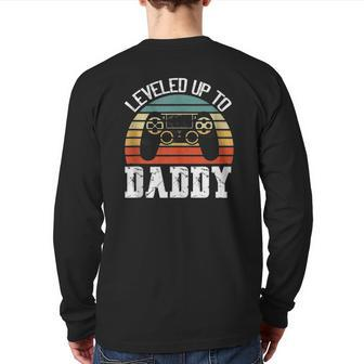 New Dad Father's Day Leveled Up To Daddy Back Print Long Sleeve T-shirt | Mazezy
