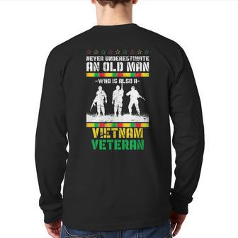 Never Underestimate An Old Men Who Is Also A Vietnam Veteran Veteran Back Print Long Sleeve T-shirt | Mazezy