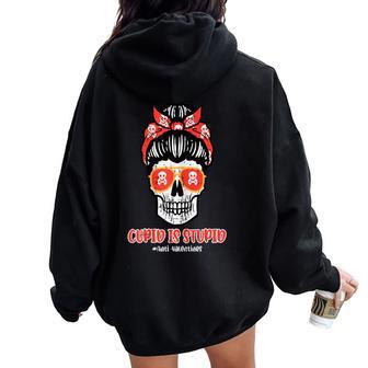 Anti Valentines Day Cupid Is Stupid Skull Messy Bun Women Women Oversized Hoodie Back Print - Monsterry