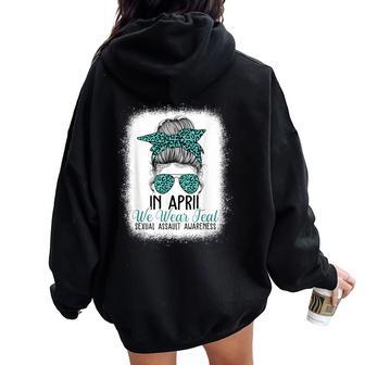 In April We Wear Teal Sexual Assault Awareness Messy Bun Women Oversized Hoodie Back Print - Monsterry