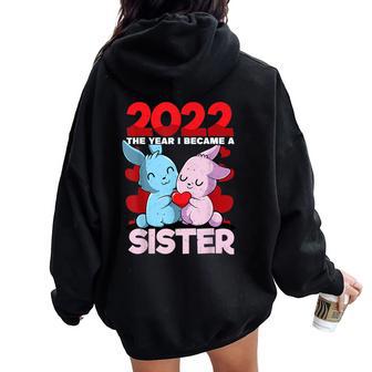 Becoming A Sister 2022 Bunny Baby Sibling Announcement Women Oversized Hoodie Back Print - Monsterry DE