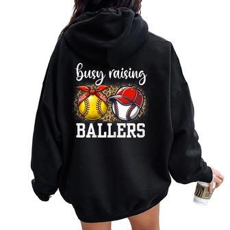 Busy Raising Ballers Softball And Baseball Leopard Print Mom Women Oversized Hoodie Back Print - Thegiftio UK