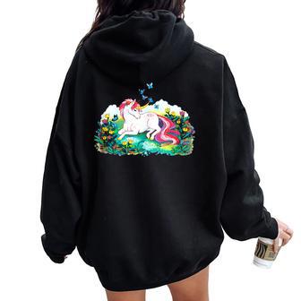 Colorful Unicorn Laying In A Flower Filled Field Women Oversized Hoodie Back Print - Monsterry AU