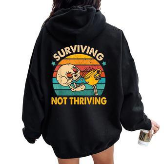 Coffee Lover Caffeinated Mom Surviving Not A Thriving Women Oversized Hoodie Back Print - Monsterry