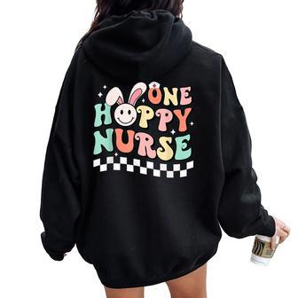 Groovy One Hoppy Nurse Bunny Spring Easter Nursing Rn Nicu Women Oversized Hoodie Back Print | Mazezy