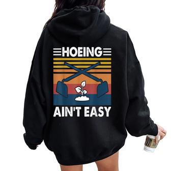 Hoeing Ain’T Easy Gardening Spring Garden Women Oversized Hoodie Back Print - Monsterry