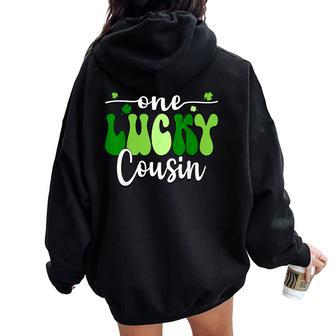 One Lucky Cousin Groovy Retro Cousin St Patrick's Day Women Oversized Hoodie Back Print | Mazezy