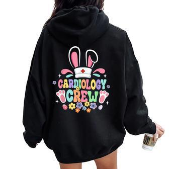 Retro Groovy Cardiology Crew Cardiac Nurse Bunny Ear Easter Women Oversized Hoodie Back Print - Seseable