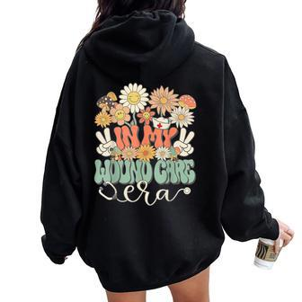 Retro Groovy In My Wound Care Era Nurse Floral Hippie Daisy Women Oversized Hoodie Back Print - Seseable
