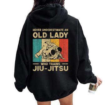 Never Underestimate An Old Lady Bjj Brazilian Jiu Jitsu Women Oversized Hoodie Back Print | Mazezy CA