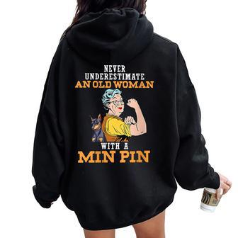 Never Underestimate An Old Woman With A Min Pin Women Oversized Hoodie Back Print - Thegiftio UK