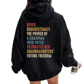 Never Underestimate The Power Of A Grandma Who Votes Women Oversized Hoodie Back Print - Seseable
