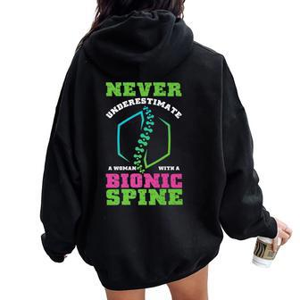 Never Underestimate Woman With Bionic Spine Scoliosis Women Oversized Hoodie Back Print - Monsterry