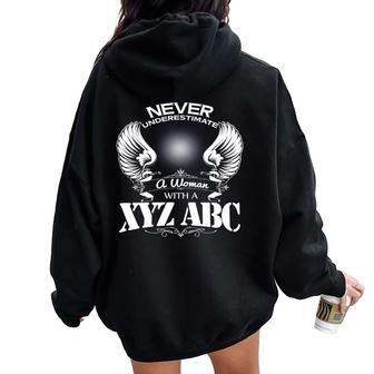 Never Underestimate A Woman With A Xyz Abc T Women Oversized Hoodie Back Print - Thegiftio UK