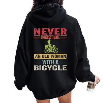 Vintage Never Underestimate An Old Woman With A Bicycle Cute Women Oversized Hoodie Back Print - Monsterry