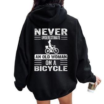 Vintage Never Underestimate An Old Woman On A Bicycle Retro Women Oversized Hoodie Back Print - Monsterry CA