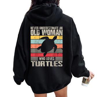 Vintage Never Underestimate An Old Woman Who Loves Turtles Women Oversized Hoodie Back Print - Monsterry DE