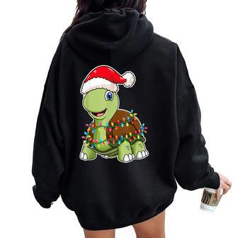 Christmas Lights Turtle Wearing Xmas Hat Sea Turtle Lover Women Oversized Hoodie Back Print - Monsterry UK