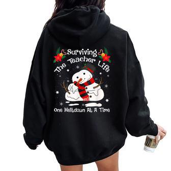 Surviving The Teacher Lifes One Meltdown At A Time Christmas Women Oversized Hoodie Back Print | Mazezy