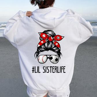 Classy Lil Sister Life Soccer Messy Bun Baseball Game Day Women Oversized Hoodie Back Print - Monsterry AU