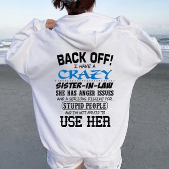 Crazy Sister In Law And I'm Not Afraid To Use Her Women Oversized Hoodie Back Print - Monsterry CA