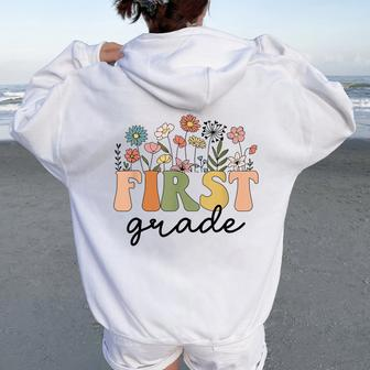 First Grade Teacher Wildflower Back To School Floral Outfits Women Oversized Hoodie Back Print - Seseable