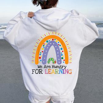 We Are Hungry For Learning Rainbow Caterpillar Teacher Women Oversized Hoodie Back Print - Seseable
