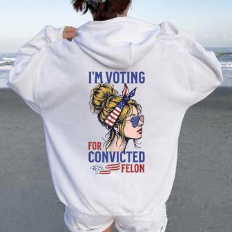 I'm Voting Convicted Felon 2024 Messy Bun Convicted Felon Women Oversized Hoodie Back Print - Thegiftio UK