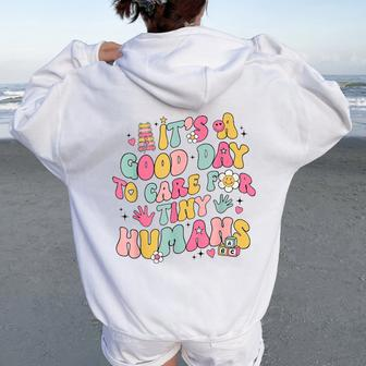 It's A Good Day To Care For Tiny Humans Retro Teacher Life Women Oversized Hoodie Back Print - Monsterry UK