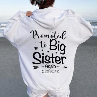 Promoted To Big Sister Again 2024 Baby Announcement Girls Women Oversized Hoodie Back Print - Seseable