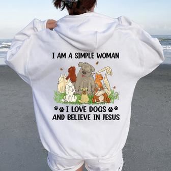 I Am A Simple Woman I Love Dogs And Believe In Jesus Women Oversized Hoodie Back Print - Seseable