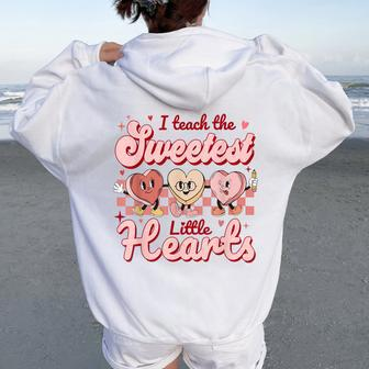 I Teach The Sweetest Hearts Retro Teacher Valentines Day Women Oversized Hoodie Back Print | Mazezy