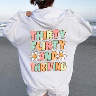 Thirty Flirty And Thriving Cute Groovy 30Th Birthday Party Women Oversized Hoodie Back Print - Thegiftio UK