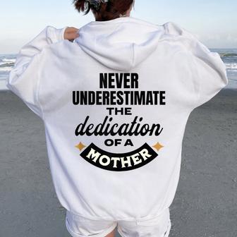 Never Underestimate The Dedication Of A Mother Women Oversized Hoodie Back Print - Thegiftio UK