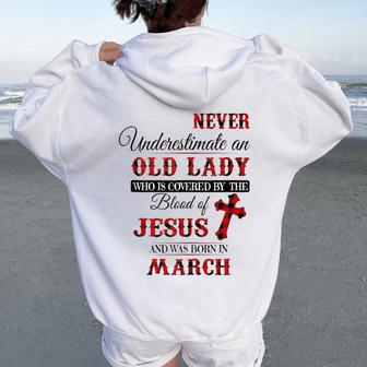 Never Underestimate An Old Lady Love Jesus Born In March Women Oversized Hoodie Back Print - Thegiftio UK