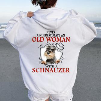 Never Underestimate An Old Woman With A Schnauzer Women Oversized Hoodie Back Print - Thegiftio UK