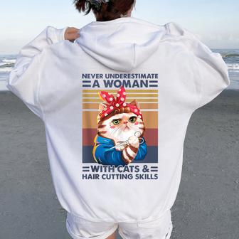 Never Underestimate A Woman With Cats & Hair Cutting Skills Women Oversized Hoodie Back Print - Monsterry DE