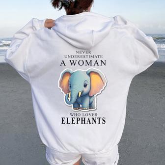 Never Underestimate A Woman Who Loves Elephants Women Oversized Hoodie Back Print - Monsterry DE