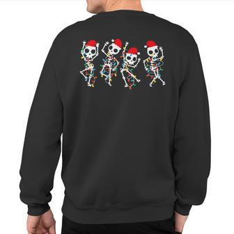 Christmas Skeleton Dancing Xmas Light Music Christmas Sweatshirt Back Print - Monsterry AU