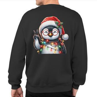 Peace Sign Hand Penguin Santa Christmas Penguin Pajamas Sweatshirt Back Print - Monsterry DE