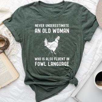 Never Underestimate An Old Woman Who Is Also Fuent In Fowl Bella Canvas T-shirt - Seseable