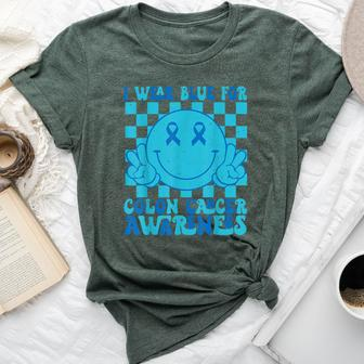 I Wear Blue For Colon Cancer Awareness Groovy Smile Face Bella Canvas T-shirt | Mazezy