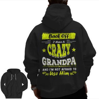 Back Off I Have A Crazy Grandpa & I'm Not Afraid To Use Him Zip Up Hoodie Back Print | Mazezy