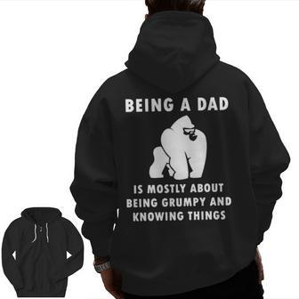 Being A Dad Is Mostly About Being Grumpy And Knowing Things Zip Up Hoodie Back Print | Mazezy