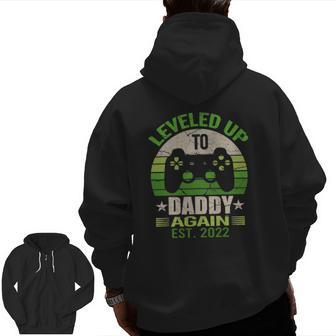 Daddy Again 2022 Leveled Up To Daddy Again Apparel Dad Zip Up Hoodie Back Print | Mazezy