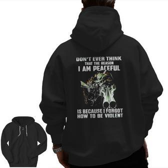 Don't Ever Think That The Reason I Am Peaceful Is Because I Forgot How To Be Violent Veterans Day Zip Up Hoodie Back Print | Mazezy