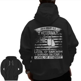 I Am A Grumpy Old Veteran My Level Of Sarcasm Depends Zip Up Hoodie Back Print | Mazezy